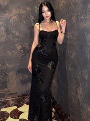 Black Embroidered Maxi Dress with a fitted silhouette, thin straps, sweetheart neckline and floral embroidery