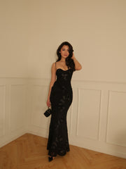 Black Embroidered Maxi Dress in sheer floral lace with thin straps, a fitted silhouette and floor-length hem