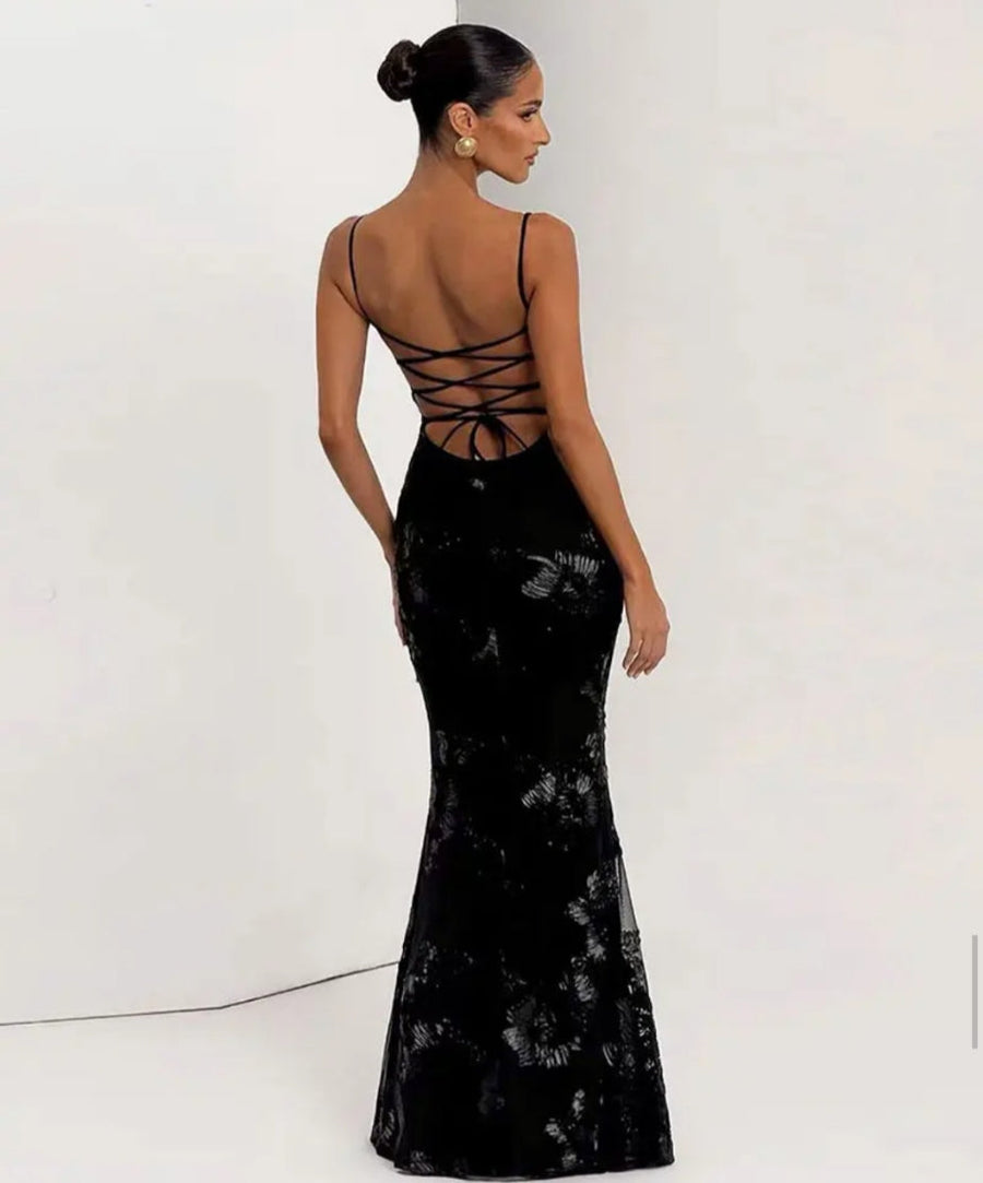 Black Embroidered Maxi Dress with a fitted floor-length silhouette, thin straps, lace-up open back and floral pattern