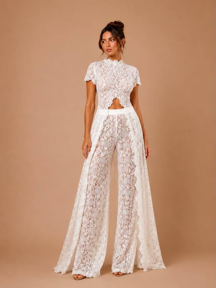 Embroidered White Lace Top in white floral lace with a high neckline, short sleeves and cropped hem