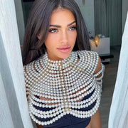 Pearl Cape Top in white with layered rows of glossy pearls, a high neckline and a scalloped cape silhouette