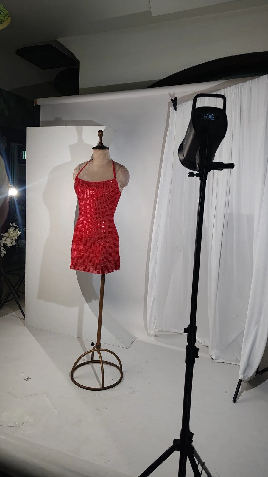 Red Rhinestone Bodycon Dress in a fitted red mesh silhouette, covered in sparkling rhinestones with thin straps