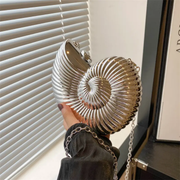 Conch shell clutch