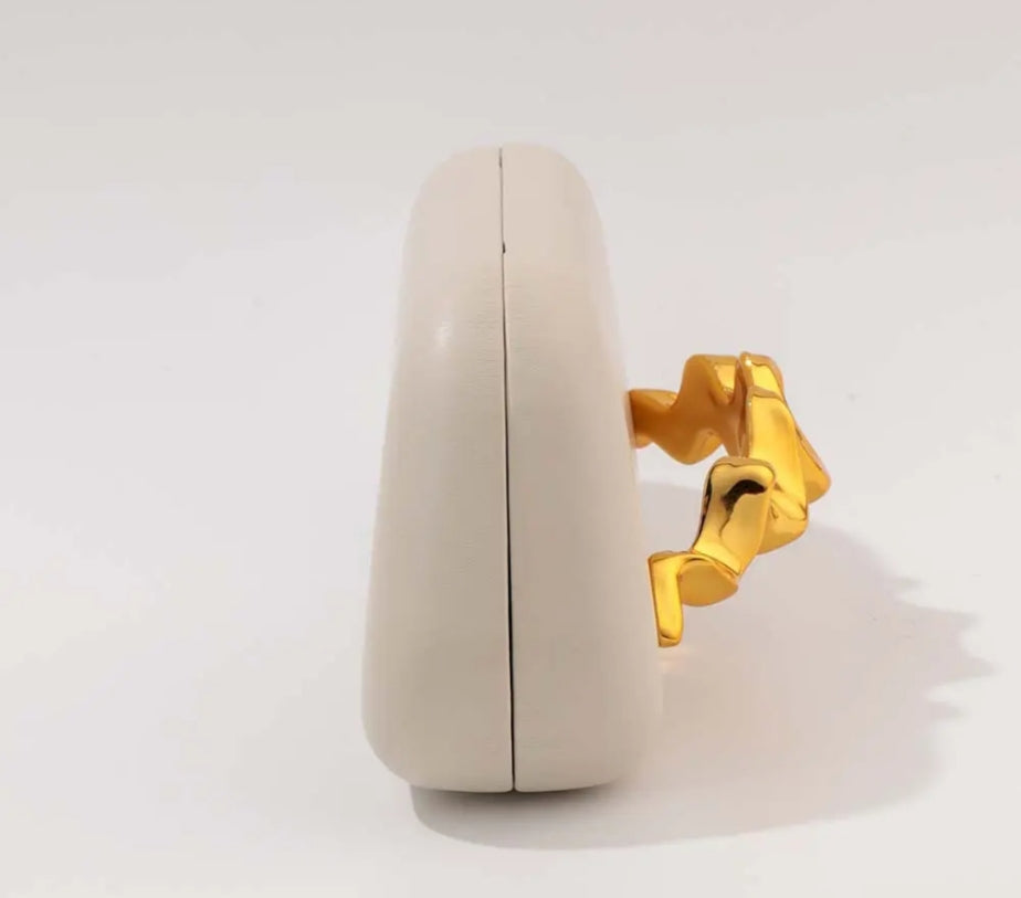 White and golden Clutch