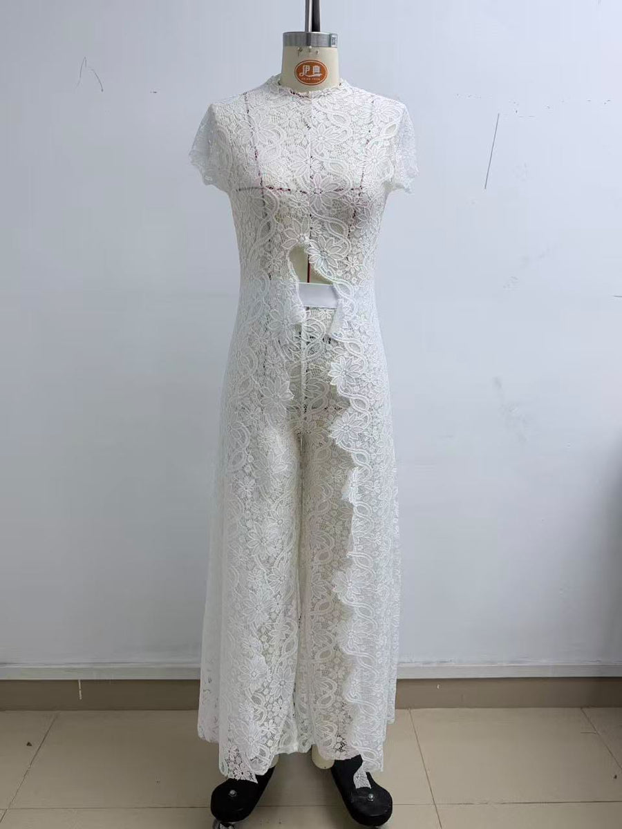 White Elegance Jumpsuit in white floral lace with short sleeves, a high neckline, waist cut-out and wide legs
