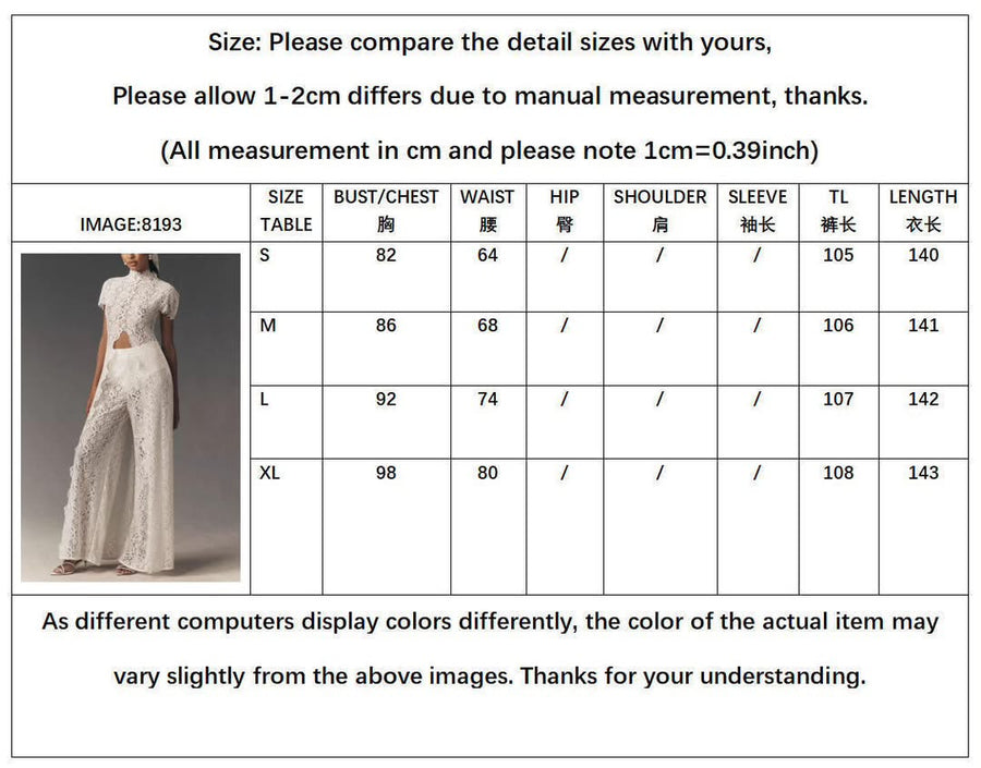White Elegance Jumpsuit in white floral lace with a high neckline, short sleeves, waist cut-out and wide legs